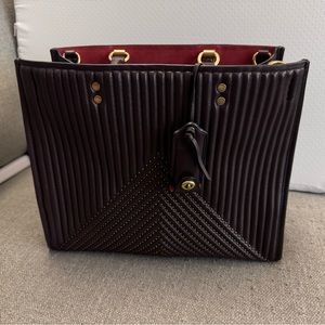 Coach 1941 Rouge Oxblood with rivets